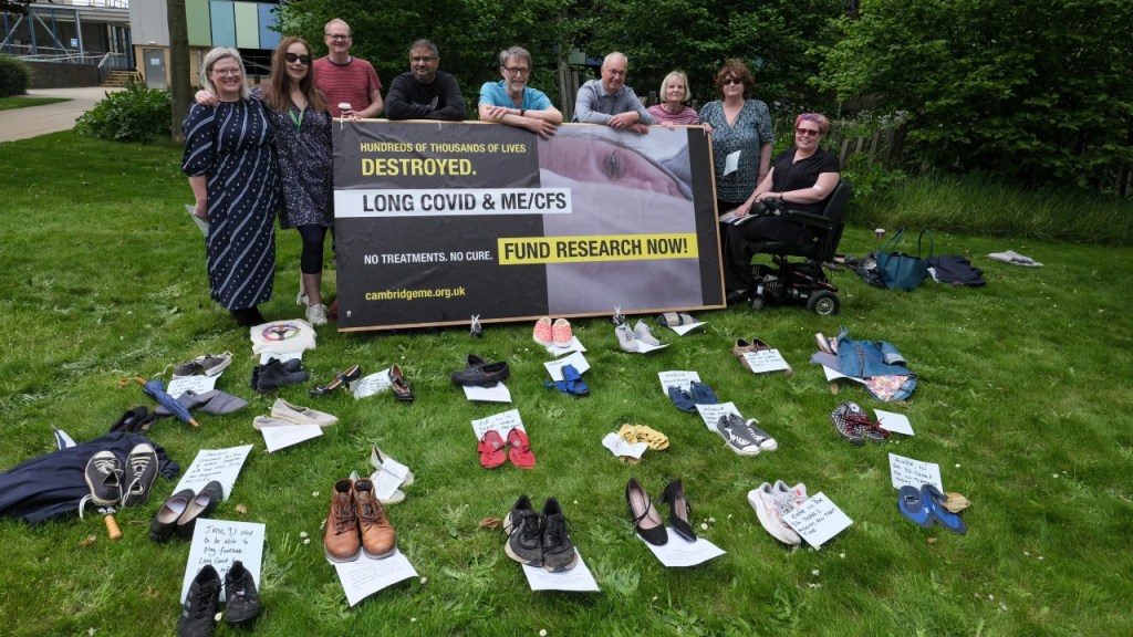 CBME members with a banner reading Long Covid and ME/CFS: Fund research now, at the Addenbrooke's demonstration